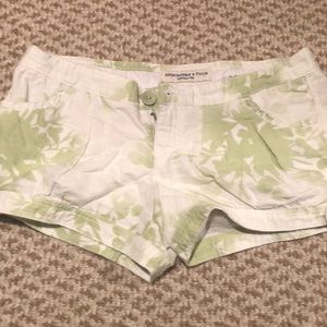 Green and white patterned shorts